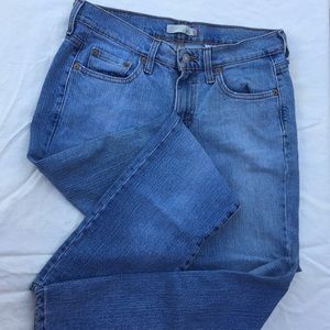Levi’s 505 distressed denim jeans